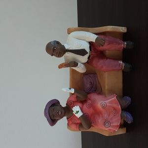 Man and woman sitting on pew